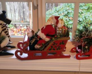 Santa on a Sleigh Decoration, Snowman Family on a Sleigh Decoration