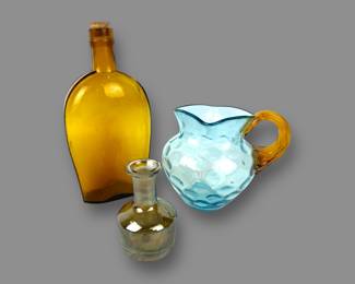#86 • Three Vintage Colored Glass Vessels
LUX.BID
