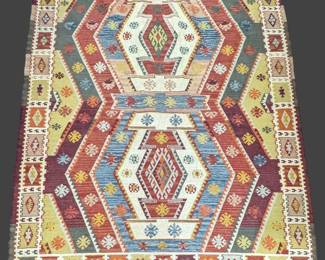 #4 • Hand-Woven 11'x8' Kilim Area Rug
LUX.BID