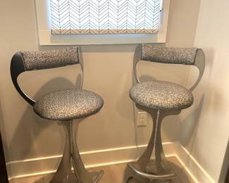 Pair of chrome swivel barstools