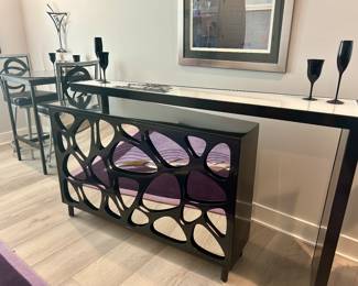 Contemporary mirrored-front pivotable shape bar, 6’ long, 17”-20” wide. 40” tall