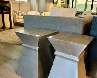 pair of matching metallic end tables