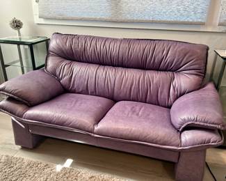 matching pair of Natuzzi purple leather loveseats. 5’5” long, 39” deep