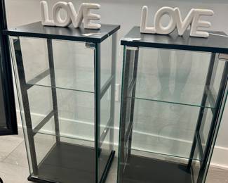 Black and glass display cabinets