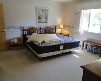 King Bed, complete with mattress, box springs, rails and headboard too