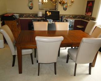 This table is amazing, along with the leather chairs too, you will see additional ones too