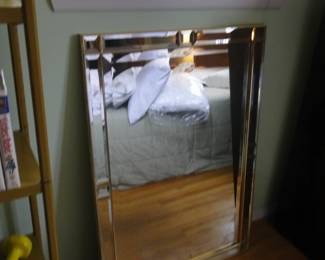 Another large beveled mirror