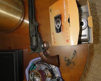 Camera and vintage pistol