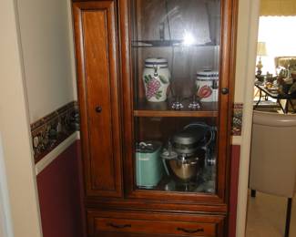 This cabinet is amazing, and would look good in any kitchen to store spices and the like.  Currently it is sitting in the dining room, holding a mixer