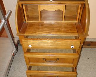 This is an really unique roll top desk, which is on the smaller side, and super cute and very cool.  If you look carefully, it is smiling at you