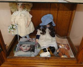 More dolls in the lighted curio cabinet