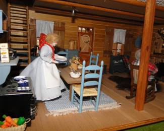 You'd think that Grandpa over there on the right could get up and lend a hand setting a table.