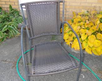 Brown chair that goes with the metal table, hose is also for sale too
