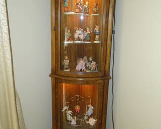 See, curio cabinet lights up