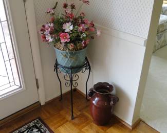Planters, plant stand and some faux flowers, along with a sneak peak at an area rug