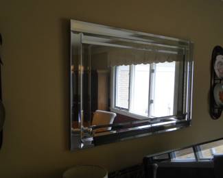 Another large beveled mirror, just hold on we have more