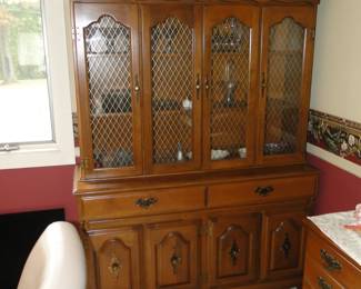 Americana cabinet.  Take the top off, mount it to the wall, find a slab of granite, and add it to the base.  PRESTO!!! A nice coffee service area, or a fantastic bar!!!