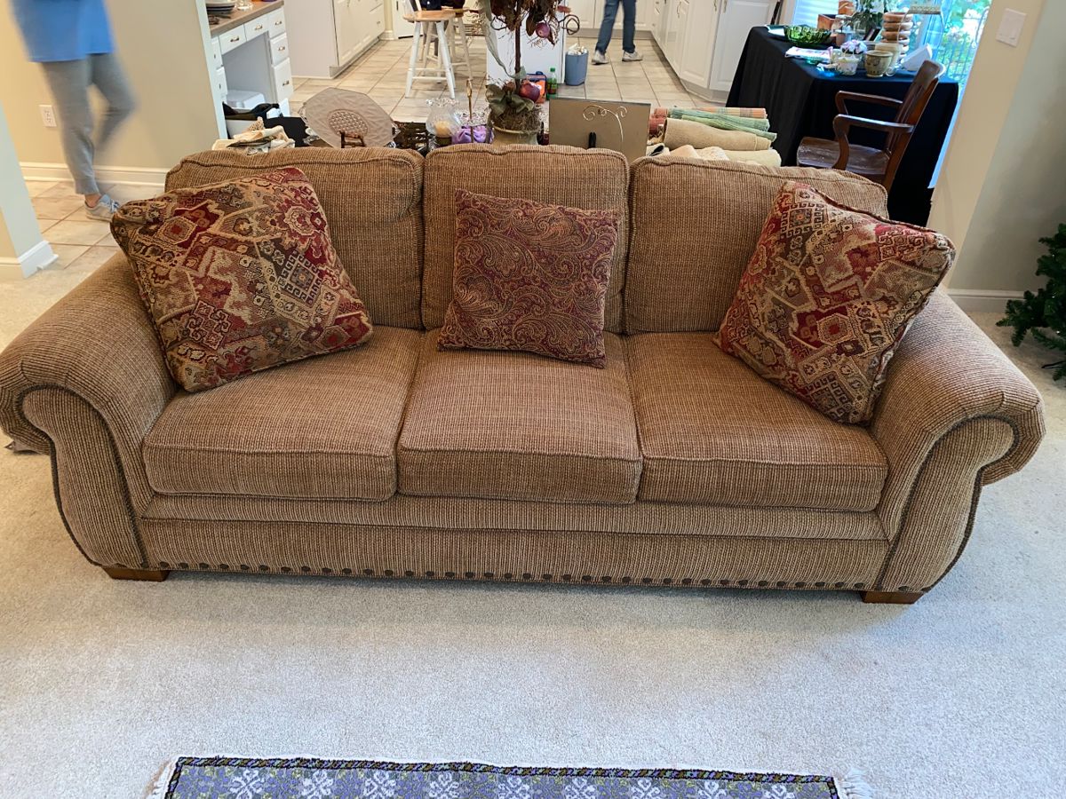 Wonderfully comfy like new couch - great snuggle times await!