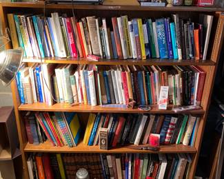 Assorted books and shelf