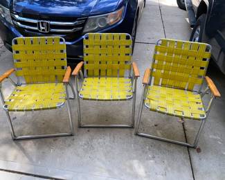Vintage wood armed lawn chairs