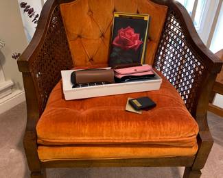 Vintage orange chair with woven sides 