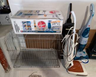 Dog crate and vacuum central