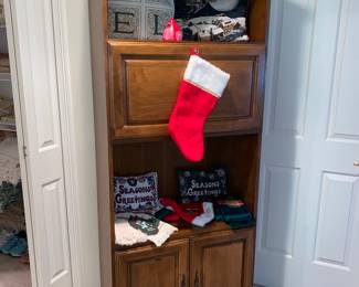 Bookcase filled with holiday 