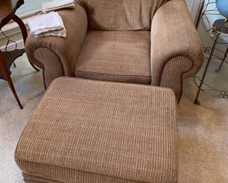 Matching upholstered armchair and footrest … curl up with your favoritei book, beverage or special someone!