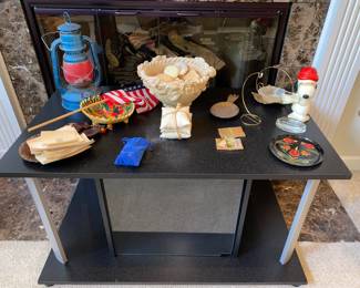 TV stand, Dietz lantern, Snoopy candle holder and more