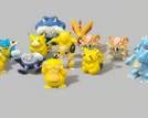 Large lot of Vintage 1990s Pokemon Mini-figurines. Including: Pikachu, Psyduck, Ratata, & more!