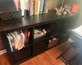 $90 each. A pair of bookcases available. Each is 58.75"w x 15.5"d x 31"h. Solid modular style. Available for online purchase Wednesday as per instructions in the sale details.