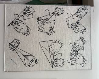 close up of the instructions on how to build a paper airplane.