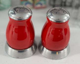 Retail: $20. Our Price: $5. These vibrant red glass shakers offer a pop of color and vintage style to your dining experience.