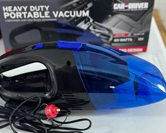 Retail $30. Our Price: $15. Car and Driver Heavy Duty Portable Vacuum. Lightweight and efficient, this vacuum is ideal for keeping your car spotless with ease.