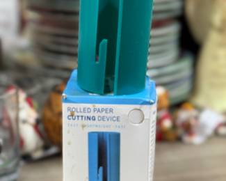 Retail $15.99. Our Price: $2. Rolled Paper Cutting Device. Easy-to-use tool for cutting rolled paper smoothly and efficiently.