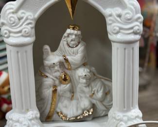 Retail $40. Our Price: $15. Porcelain Nativity Light-Up Arch. Elegant and detailed, this light-up nativity scene adds a warm glow to your Christmas display.