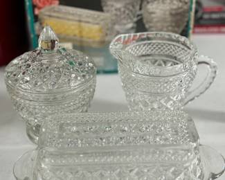 Retail $40. Our Price: $18. Home Classics Crystal Glass Set. Beautifully crafted glassware set including a butter dish, sugar bowl, and creamer for your dining table.