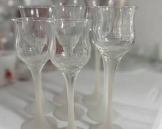 Retail $40. Our Price: $15. Set of eight frosted glass candle holders, adding elegance to any decor.