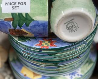 Retail $90. Our Price: $35. **Sierra Earthenware Dinnerware Set by Certified International.** This colorful set includes mugs and plates with vibrant Southwest designs, perfect for adding a splash of color to your table.