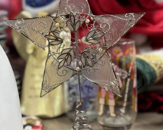 Retail $18. Our Price: $1. Decorative Wire Star Tree Topper. Intricate wire star with pearl accents for a festive tree finish.