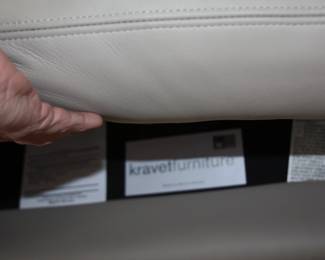 pair of leather swivel chairs by Kravet