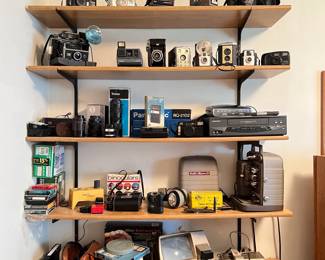 old cameras poloroids and brownies