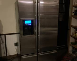 Stainless steel fridge and freezer.
6’ wide freezer box in basement.
