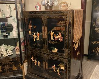 Oriental chest and glass cabinet. Antique decor.