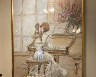 Grand piano framed large artwork.