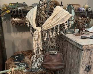 Dress form, leather purse, 