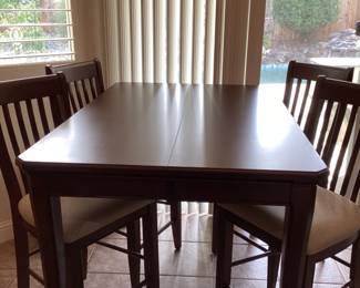 High top kitchen table- includes 6 chairs and leaf