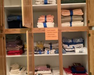 Lots of never used bath and kitchen towels