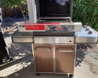 Weber cover and this rotisserie accessory included