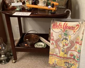 All the vintage items grouped here, on a cute rolling bar cart